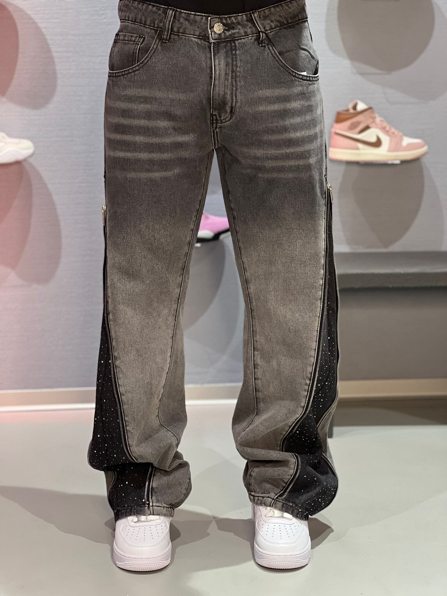 Jeans Flare con zip strass