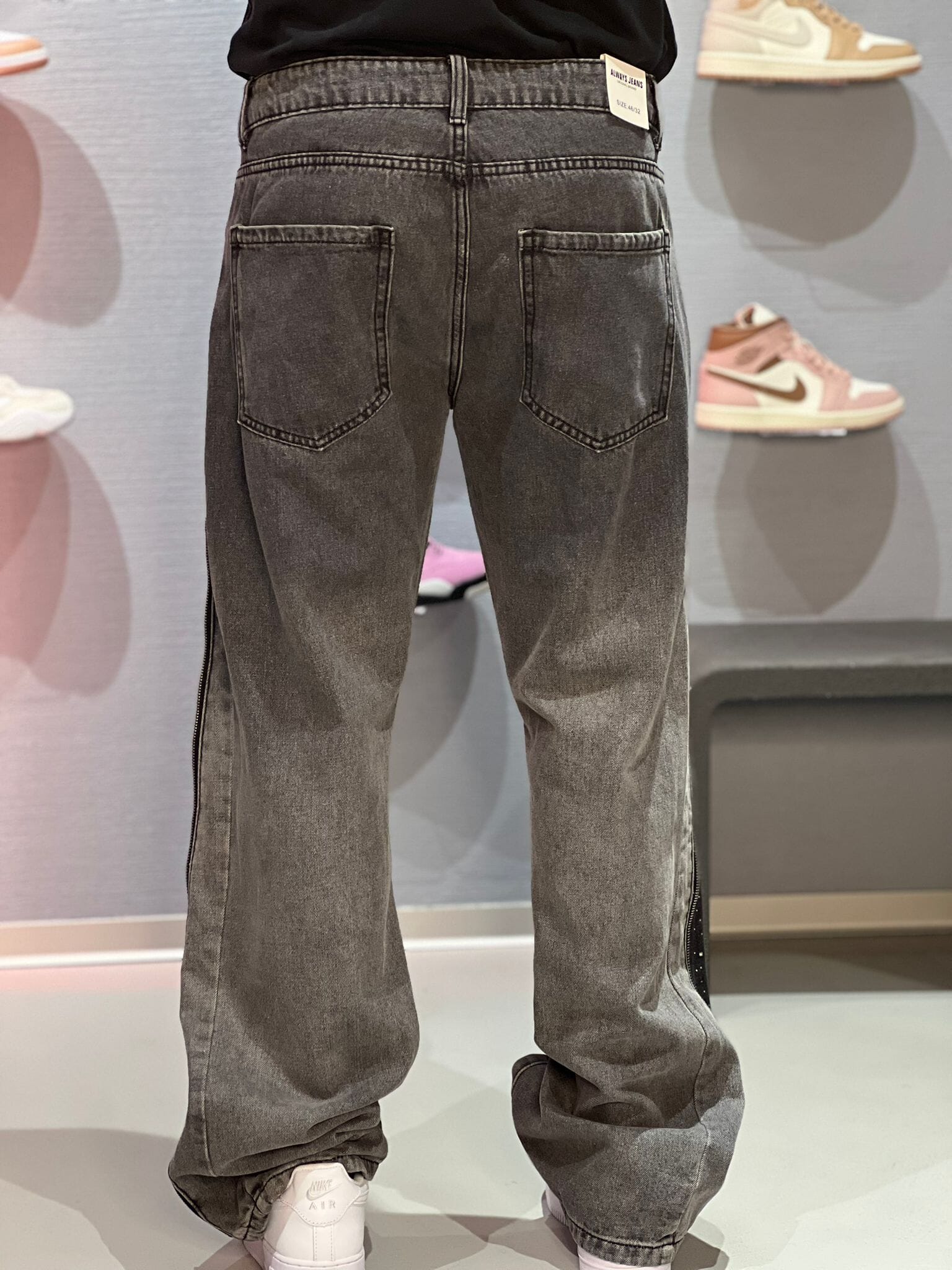 Jeans Flare con zip strass