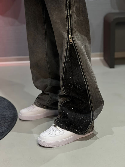 Jeans Flare con zip strass